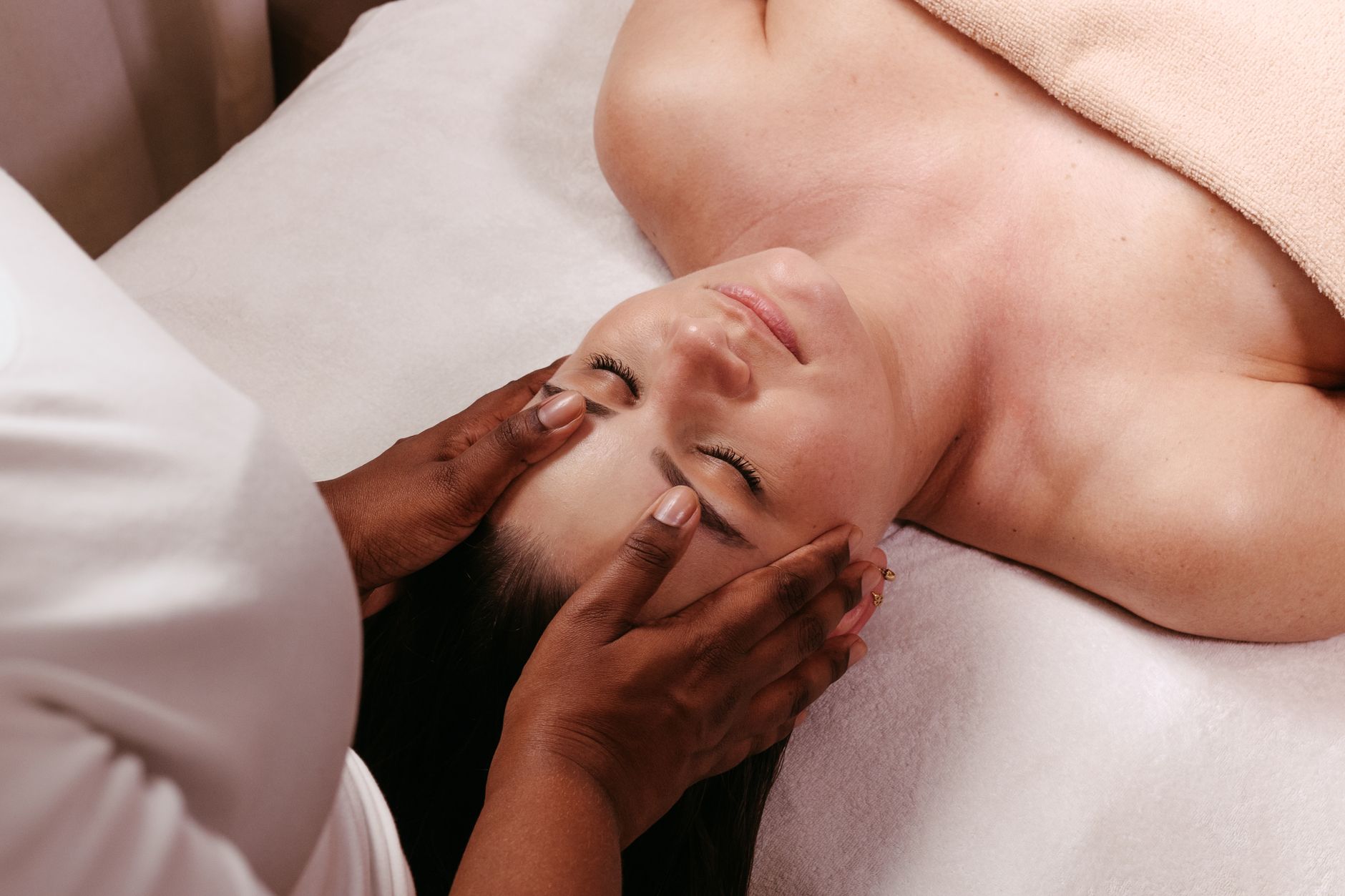 Gentle hands-on head touch technique for nervous system relaxation